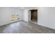 Finished basement featuring neutral paint, gray flooring, and walkout access at 2667 White Rock Dr, Buford, GA 30519
