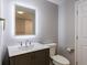 Bathroom featuring modern fixtures, vanity, toilet and new paint at 2667 White Rock Dr, Buford, GA 30519