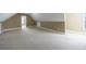 Spacious bedroom with neutral walls and carpet, and two windows with blinds at 2667 White Rock Dr, Buford, GA 30519