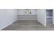 Bright room featuring modern gray flooring and fresh neutral paint throughout at 2667 White Rock Dr, Buford, GA 30519