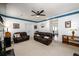 Relaxing living room with comfortable furniture, a fireplace, and neutral tones at 302 Cimarron Way, Lawrenceville, GA 30044