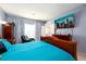 Large primary bedroom, which features a sitting area and a modern media setup at 302 Cimarron Way, Lawrenceville, GA 30044