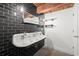 Unique bathroom features subway tile walls and a large vintage trough sink at 644 Wells Sw St # 8, Atlanta, GA 30310