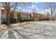 Inviting exteriors featuring brick buildings, balconies and convenient parking in a tree lined setting at 644 Wells Sw St # 8, Atlanta, GA 30310