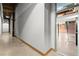 Hallway with access to the finished basement and concrete floors and exposed wood beams at 644 Wells Sw St # 8, Atlanta, GA 30310