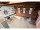 Open-concept kitchen with stainless steel appliances and exposed brick walls at 644 Wells Sw St # 8, Atlanta, GA 30310