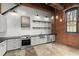 Well-equipped kitchen featuring stainless steel appliances and white subway tile backsplash at 644 Wells Sw St # 8, Atlanta, GA 30310