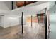 Spacious living room featuring high ceilings, exposed brick, and an industrial-chic staircase at 644 Wells Sw St # 8, Atlanta, GA 30310