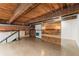 Loft featuring a wood accent wall and exposed brick at 644 Wells Sw St # 8, Atlanta, GA 30310