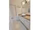 Bathroom with vanity, granite counters, and decorative plants at 6980 Roswell Rd # E1, Atlanta, GA 30328