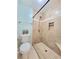 Modern tiled walk-in shower with a built-in bench at 6980 Roswell Rd # E1, Atlanta, GA 30328