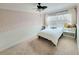 Cozy bedroom with a comfortable bed and lots of natural light at 6980 Roswell Rd # E1, Atlanta, GA 30328
