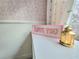 Close up of the detail in a charming, pink accent bedroom at 6980 Roswell Rd # E1, Atlanta, GA 30328