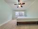 Bedroom featuring a ceiling fan and a large window at 6980 Roswell Rd # E1, Atlanta, GA 30328