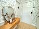 Charming foyer featuring a decorative mirror and console table at 6980 Roswell Rd # E1, Atlanta, GA 30328