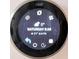 Close up view of a Nest thermostat at 6980 Roswell Rd # E1, Atlanta, GA 30328