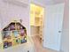 Bright walk-in closet with custom shelving for optimal storage solutions at 6980 Roswell Rd # E1, Atlanta, GA 30328