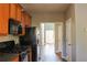 Charming kitchen with stainless steel refrigerator and black gas stove at 910 Lakeside Ct, Loganville, GA 30052