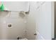 Small laundry room with a shelf, electrical outlets, and washer and dryer hookups at 910 Lakeside Ct, Loganville, GA 30052