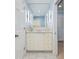 Bathroom with a modern vanity, marble flooring, and elegant lighting fixtures at 2850 Gant Quarters Dr, Marietta, GA 30068