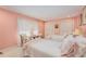Charming pink bedroom featuring twin beds, soft lighting, and elegant decor at 2850 Gant Quarters Dr, Marietta, GA 30068