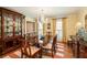 Bright formal dining room with a chandelier and elegant furnishings and hardwood floors at 2850 Gant Quarters Dr, Marietta, GA 30068