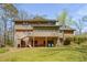 Rear view of the home showing the porch, patio and access to the backyard at 2850 Gant Quarters Dr, Marietta, GA 30068