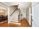 Elegant foyer featuring a hardwood floor, staircase with decorative railing, and a chandelier at 2850 Gant Quarters Dr, Marietta, GA 30068