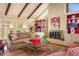 Living room with vaulted ceiling, exposed beams, fireplace, and hardwood floors at 2850 Gant Quarters Dr, Marietta, GA 30068