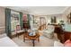 Inviting living room with hardwood floors, stylish seating, and ample natural light at 2850 Gant Quarters Dr, Marietta, GA 30068