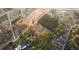 An aerial perspective of home near development area with wooded area and nearby homes at 3856 Egypt Rd, Snellville, GA 30039