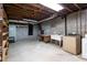 The basement laundry area includes a utility sink, washer, dryer, and open shelving at 3856 Egypt Rd, Snellville, GA 30039