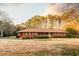 Charming brick ranch-style home with a well-maintained lawn and mature trees in a tranquil setting at 3856 Egypt Rd, Snellville, GA 30039