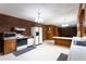 Spacious kitchen with classic appliances, wood cabinets, and functional layout for easy meal preparation at 3856 Egypt Rd, Snellville, GA 30039