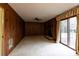 Living room featuring brick fireplace and sliding glass door to the outside at 3856 Egypt Rd, Snellville, GA 30039