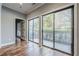 Balcony access with sliding glass doors, and hardwood floors at 2921 Lenox Ne Rd # 113, Atlanta, GA 30324