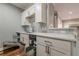 Contemporary kitchen features stainless steel appliances and light gray backsplash at 2921 Lenox Ne Rd # 113, Atlanta, GA 30324