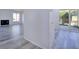 The living room is light and bright, and features wood-look floors at 1124 Country Ct, Lawrenceville, GA 30044