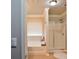 Bathroom featuring a soaking tub with window and a glass enclosed shower at 2620 Sardis Chase Court, Buford, GA 30519