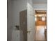 Unfinished basement with access door and wood flooring at 3637 Windmill Rd, Ellenwood, GA 30294