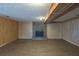 Finished basement features a brick fireplace and wood flooring at 3637 Windmill Rd, Ellenwood, GA 30294