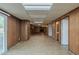 Spacious basement featuring updated flooring and a fireplace at 3637 Windmill Rd, Ellenwood, GA 30294