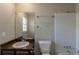 Bathroom with single sink vanity and combined shower and tub at 3637 Windmill Rd, Ellenwood, GA 30294