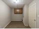 Laundry room with cabinets and white walls at 3637 Windmill Rd, Ellenwood, GA 30294