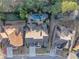Aerial view of backyard with custom pool, spa and patio, with a lush lawn and mature trees for privacy at 4916 Locklear Way, Marietta, GA 30066