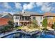 Backyard featuring a large deck, pool and well-maintained landscaping at 4916 Locklear Way, Marietta, GA 30066