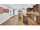 Finished basement with bar, granite counters, custom cabinets, lighting, and wood-look floors at 4916 Locklear Way, Marietta, GA 30066