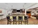 Finished basement with bar, custom cabinets, barstool seating, lighting, and tv at 4916 Locklear Way, Marietta, GA 30066