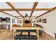 Finished basement with a kitchenette, bar, entertainment center and beautiful wood beam ceilings at 4916 Locklear Way, Marietta, GA 30066