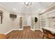 Craft space featuring built-in shelving, luxury vinyl flooring and recessed lighting at 4916 Locklear Way, Marietta, GA 30066